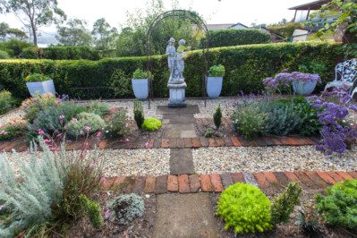 statue, garden, pot plants, flowers, launceston